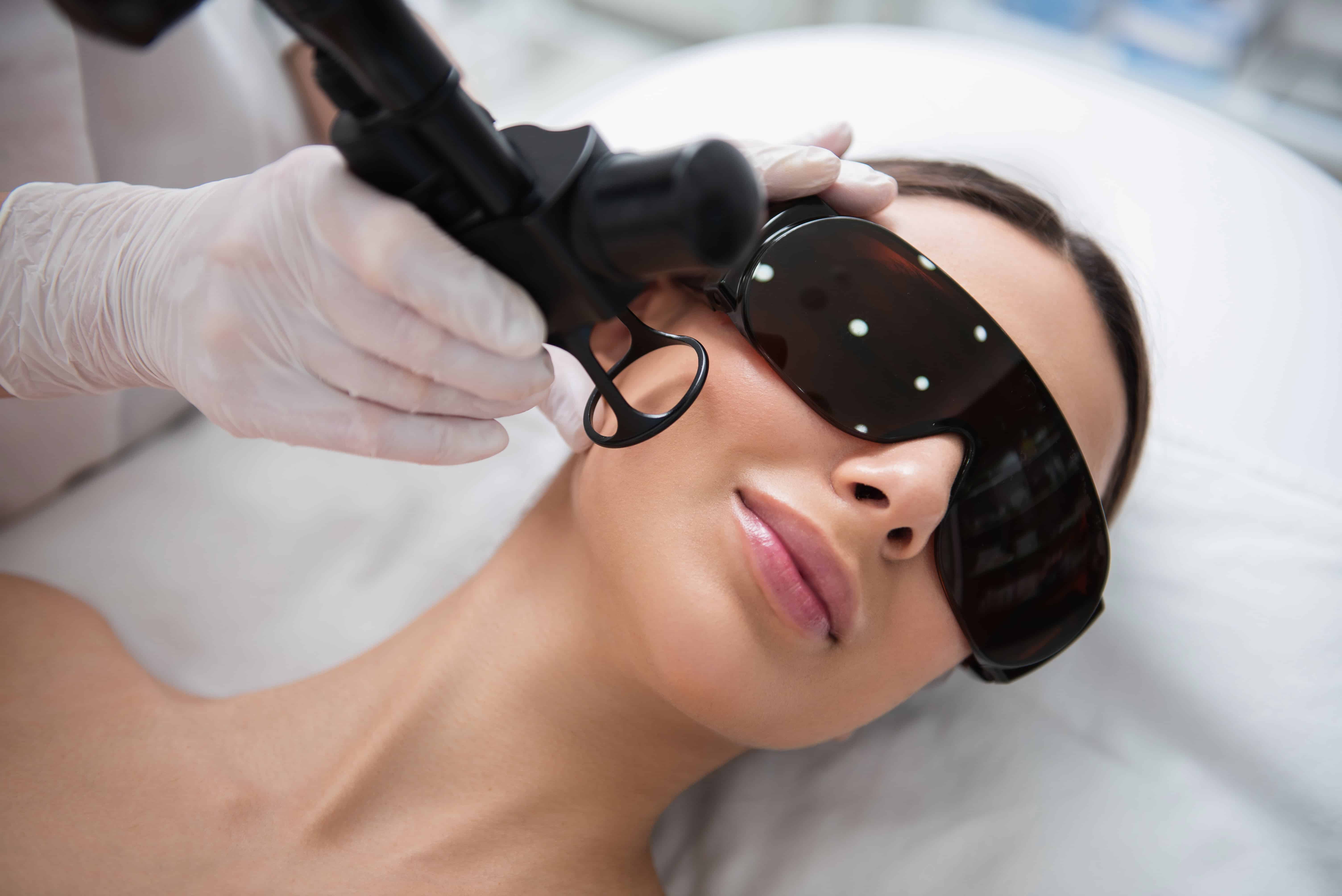 a lady getting a fractional laser treatment
